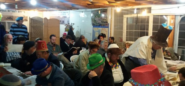 Dozens of people at the Megillah reading in Oz veGaon